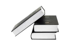 three volumes of textbooks on a white background