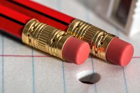 red pencil with erasers