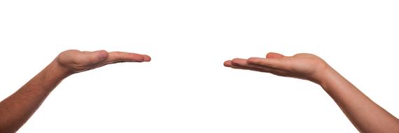 giving hand on white