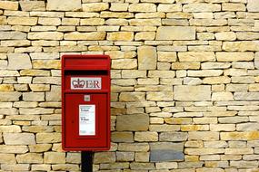 Post-Box red and stone wall