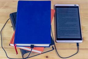 photo of e-book connected to the book