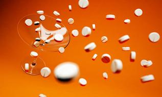 cocktail tablets at orange color background