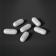 six pills, black and white