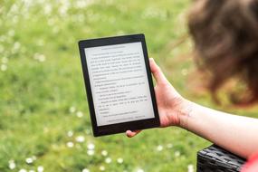 read an e-book outdoors in the garden