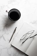 Cup of Black Coffee on desk
