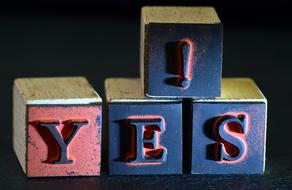 Yes, letters on worn cubes at darkness