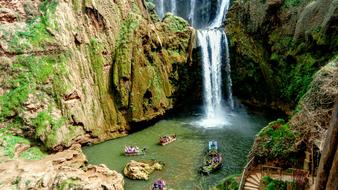 people on boats near Ouzoud Falls, morocco