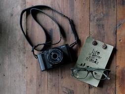 Camera and Notebook and Glasses