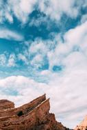 Rocky Mountains and Clouds on Sky