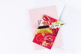 Notebook and Pen on White Desk
