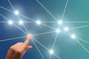 photo of hand and web of communications