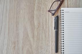 Pen Notebook and Eyewear