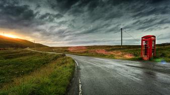 red telephone booths in the highlands in Scotland