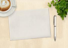 note pad pen and coffee