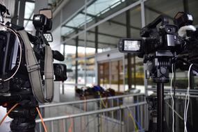 camera of journalists
