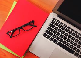 Computer Laptop Book red and sunglasses