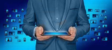 businessman holding tablet