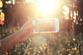 take a selfie under the bright sun