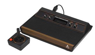 Retro Atari console at white background
