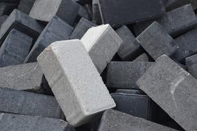 closeup photo of gray concrete bricks