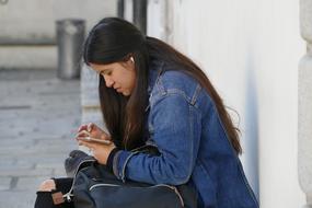 girl with smartphone outside