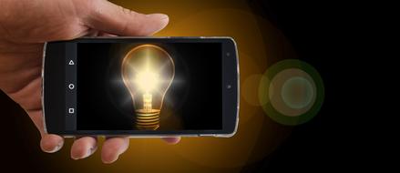 clipart of shining lightbulb on screen of smartphone