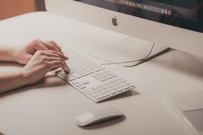 Apple Computer key Hands