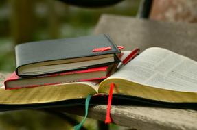 notebooks on open Bible