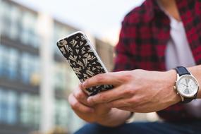 iPhone in the hands of a man