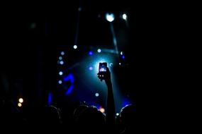 Concert, Crowd with phones in darkness