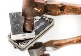 broken Iphone with hammer