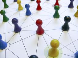 Colorful game characters in the web, on the white surface