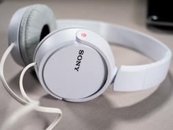 Sony white headphones on the table