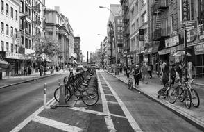 monochrome photo of People on Street Road