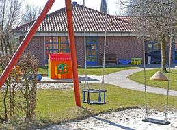 Swing over Sand on Kindergarten Playground