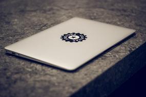 Beautiful MacBook Air laptop, on the table, in light