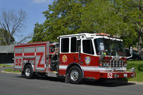 fire truck on a city street on a sunny day