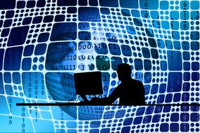 Silhouette of Man at Desk at globe with binary code, Network