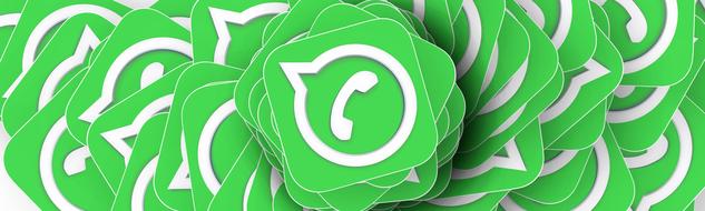 Pile of the green and white "WhatsApp" logos, clipart