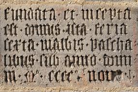 latin script on a stone tablet