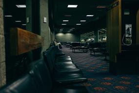Big, empty waiting room with the chairs and lights