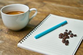 Coffee Cup Beverage and notebook