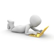 figurine with golden laptop as concept design