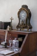Beautiful, old clock, near the cross