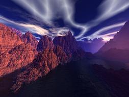 mountains in the desert against the backdrop of the sunset