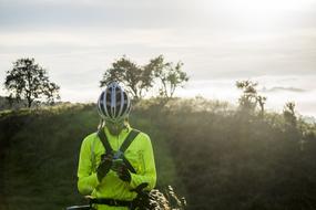 cycling in the mountains in the morning haze