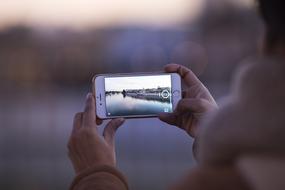 panorama of the embankment on the smartphone screen