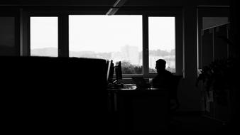 photo of a man in a dark office