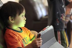 Kids Playing with tablet