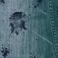 Blue and grey denim in black paint splatter